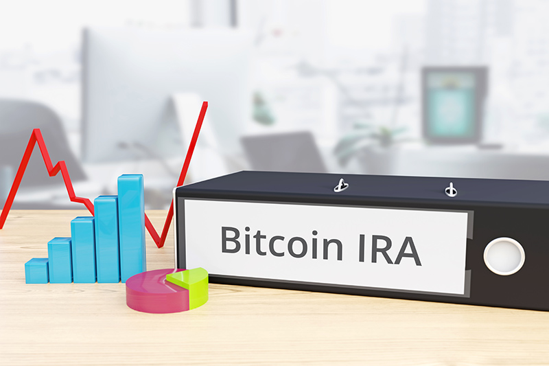 bitcoin ira finance economy folder on desk with label beside diagrams business